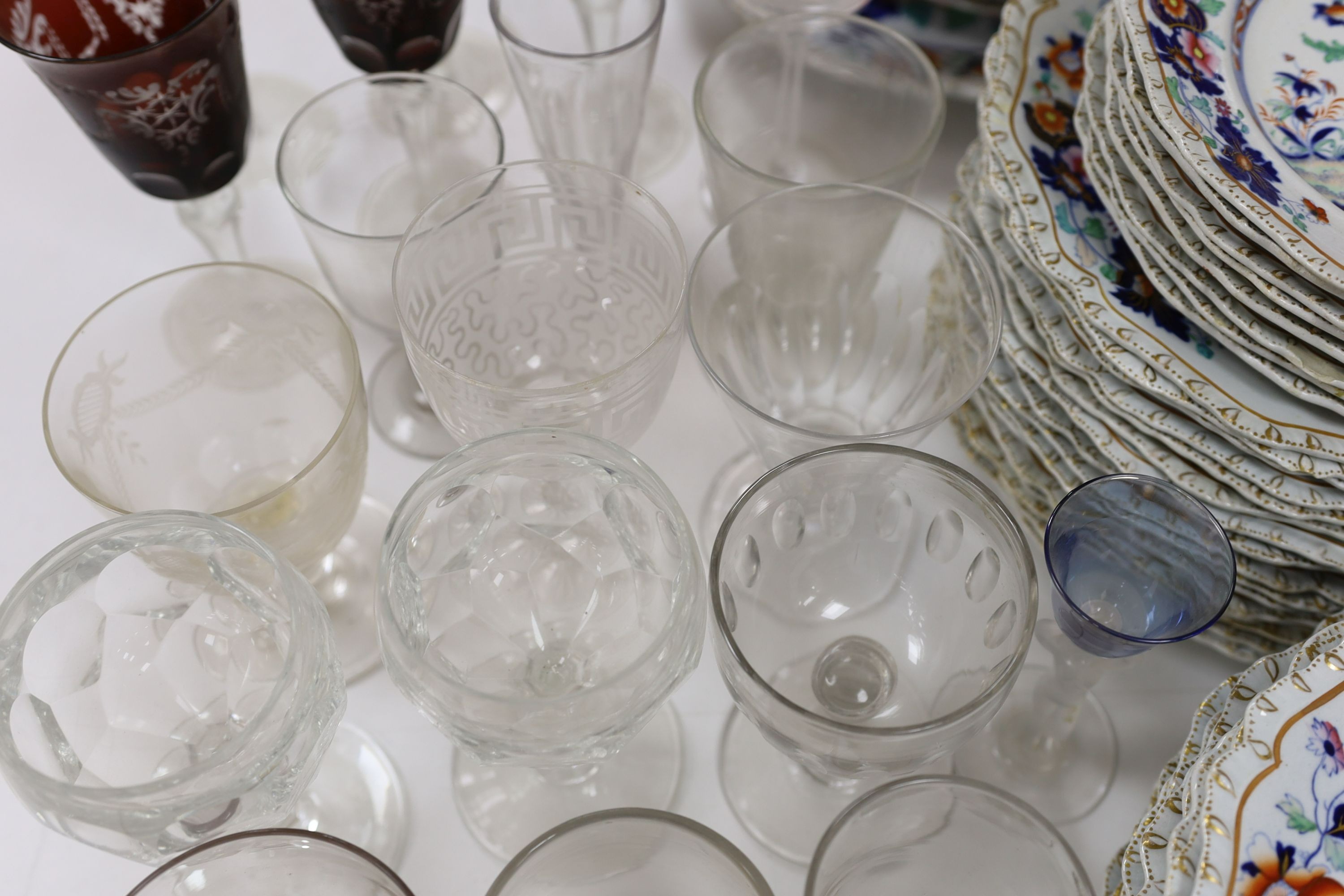 A collection of mostly 19th century rummers and ruby etched glass wine glasses, flutes etc.